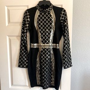 Beautiful black and gold Venus brand dress.